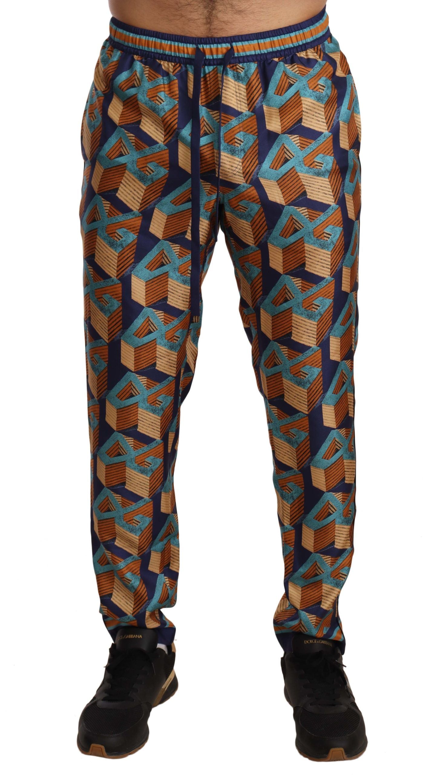 Pantalon jogger en soie Dolce & Gabbana à motif multicolore, pantalon décontracté élégant avec design vibrant.