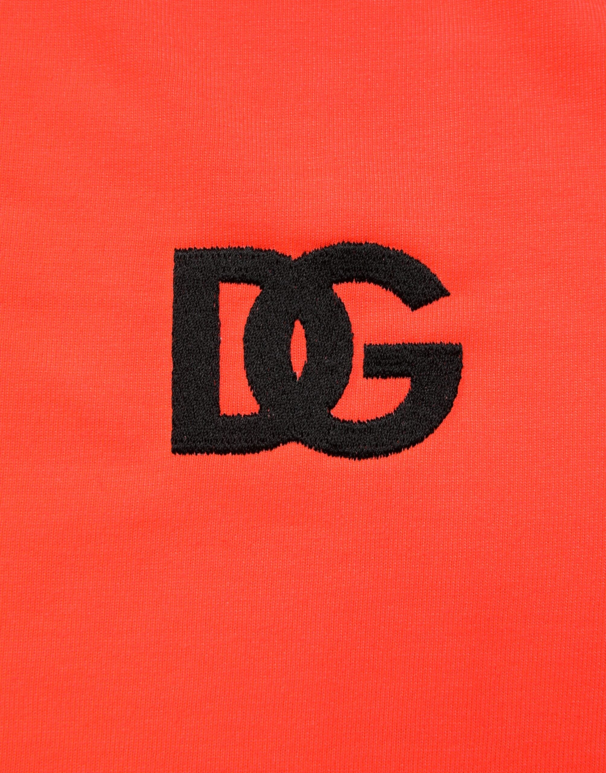 T-shirt homme Dolce & Gabbana en polyester orange néon avec col rond, vue de face.
