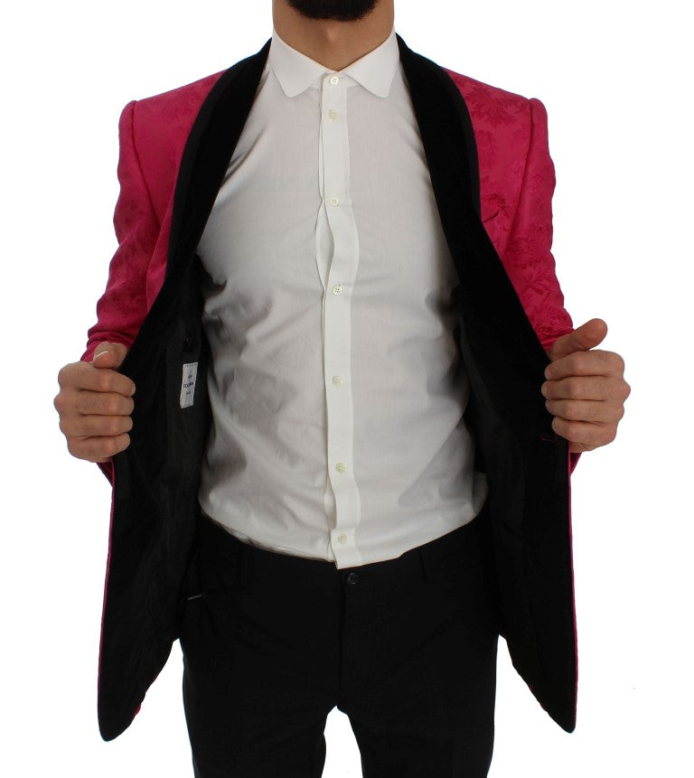 Blazer slim en brocart floral rose de Dolce & Gabbana, veste élégante en tissu riche et détaillé.