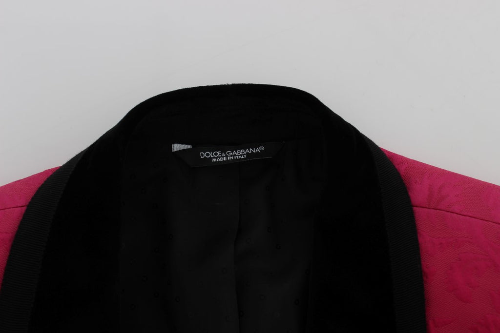 Veste blazer slim en brocart floral rose Dolce & Gabbana, élégante et raffinée, visible en détail dans l'image.