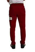 Pantalon de jogging rouge Dolce & Gabbana en coton avec logo patch, style décontracté et confortable.
