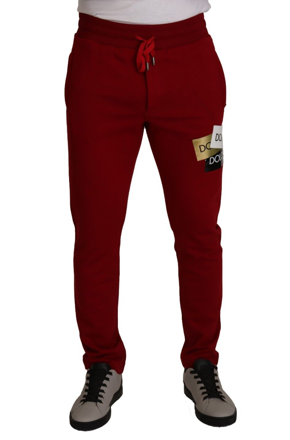 Pantalon de jogging Dolce & Gabbana en coton rouge avec logo brodé, style décontracté et confortable.