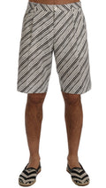 Shorts décontractés blanches et noires à rayures de Dolce & Gabbana, style casual, en tissu léger.