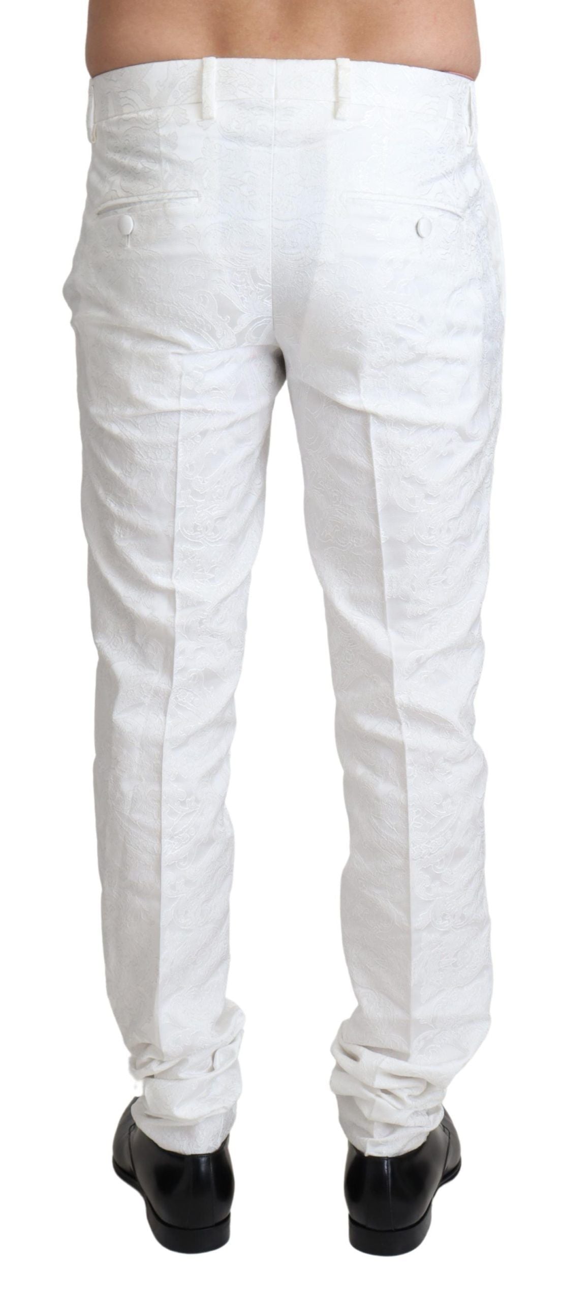 Pantalon de costume en jacquard blanc de Dolce & Gabbana, élégant et sophistiqué, avec détails en brocart.
