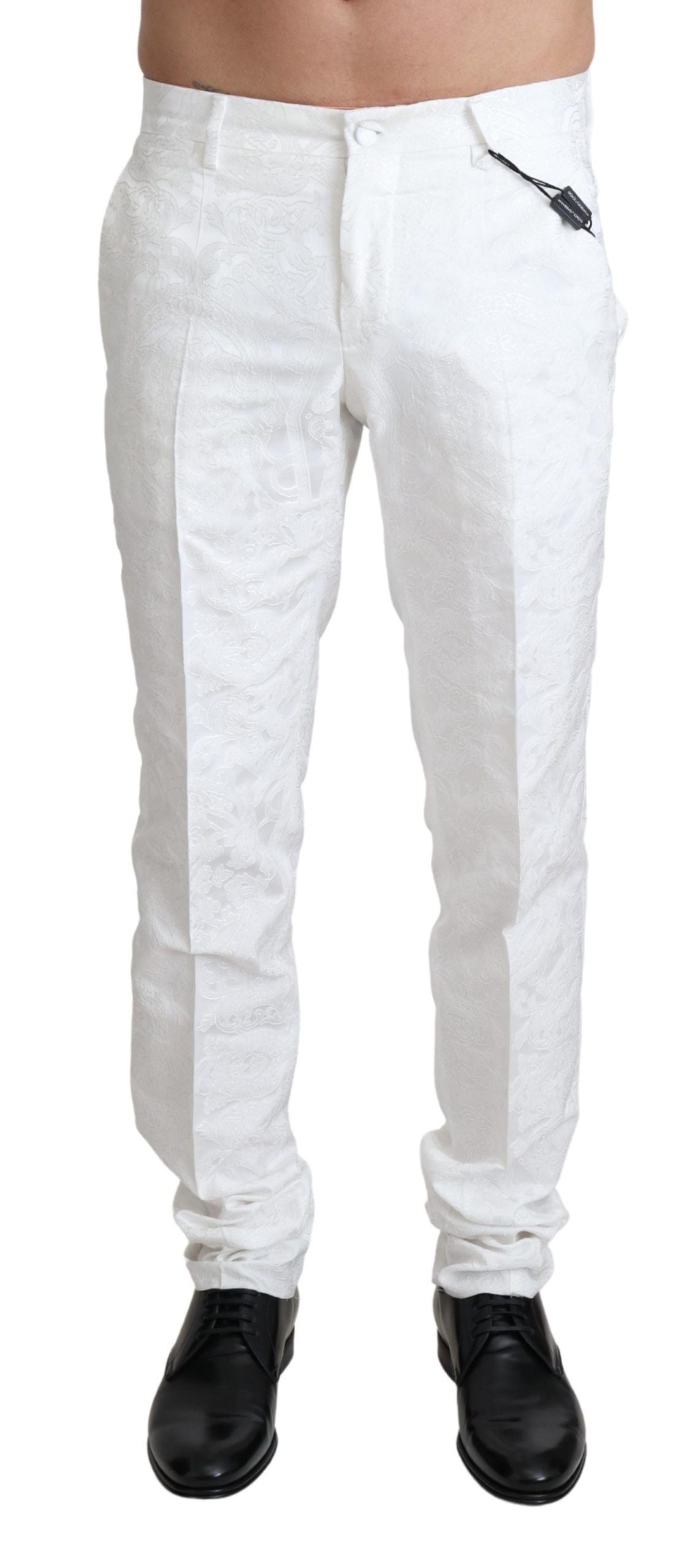Pantalon de costume en brocart blanc Dolce & Gabbana, style élégant avec détails sophistiqués et tissu brodé luxueux.