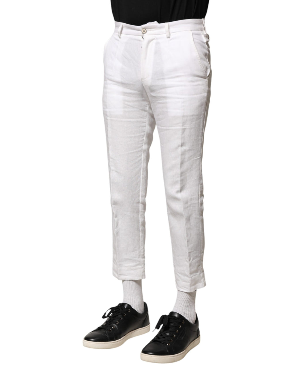 Pantalons courts en lin blanc Dolce & Gabbana à taille moyenne, décontractés et élégants, visibles en image.