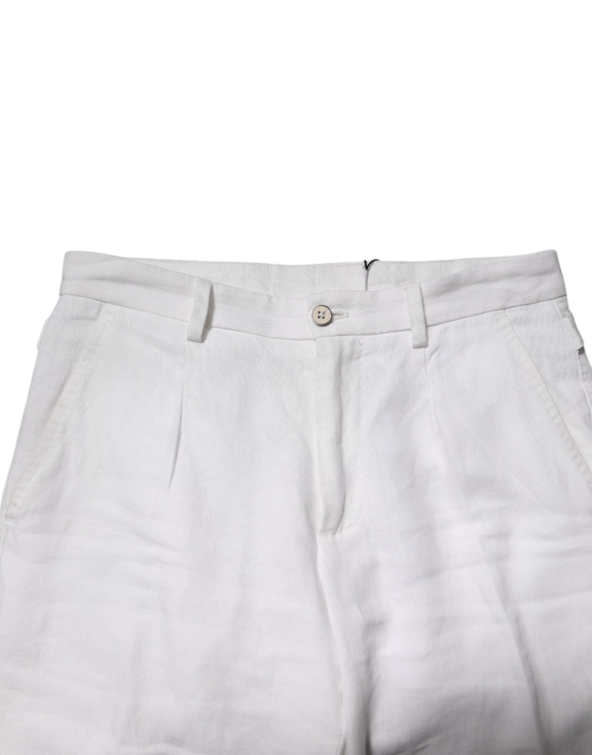 Pantalons cropped en lin blanc Dolce & Gabbana à taille moyenne, décontractés et élégants, visibles sur l’image.