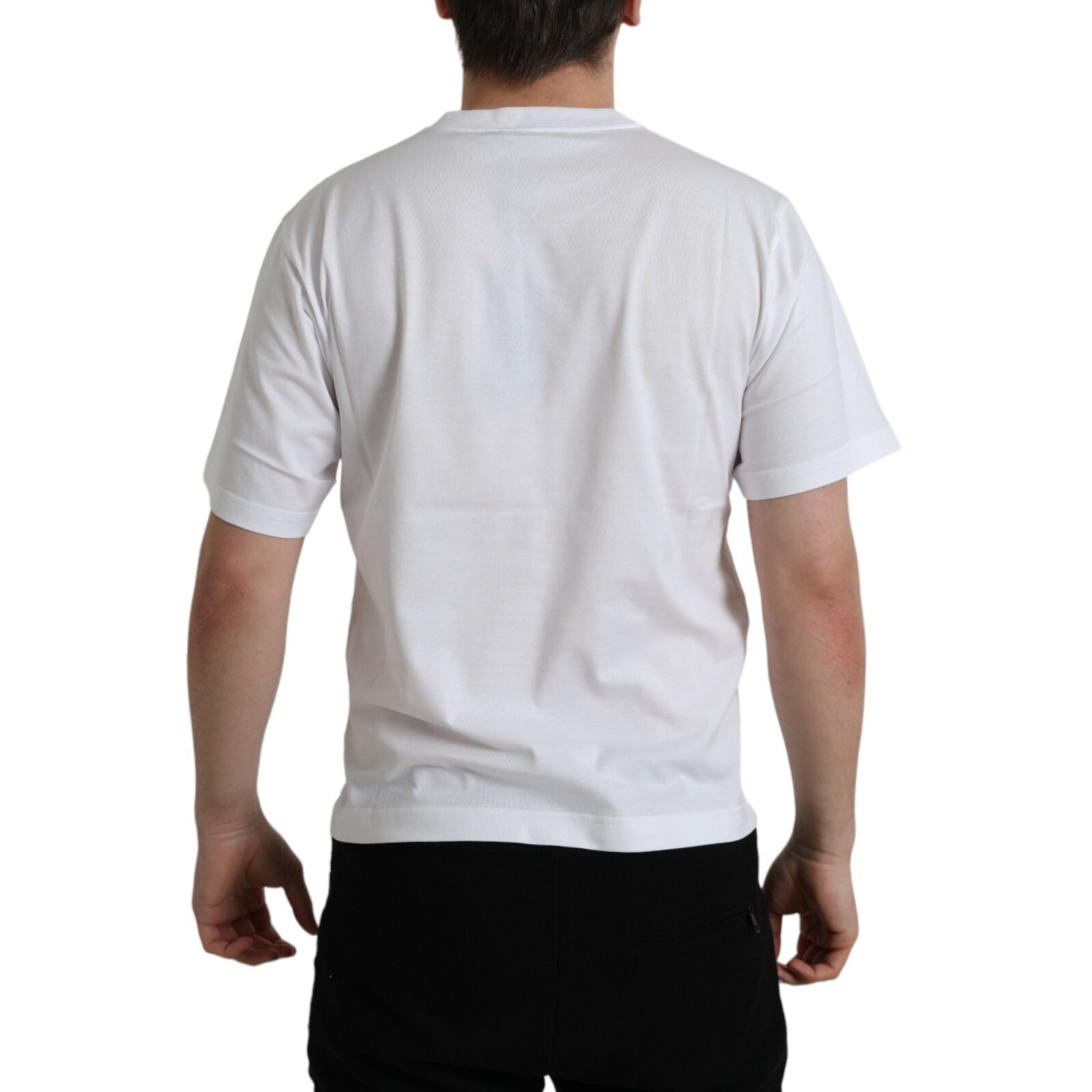 T-shirt blanc Dolce & Gabbana avec logo, col rond en coton, style décontracté et moderne, visible sur l'image.