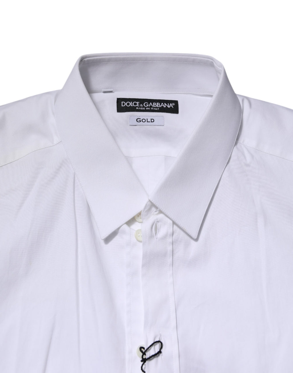 Chemise formelle blanche en coton Dolce & Gabbana avec manches longues et détails dorés, élégante et sophistiquée.