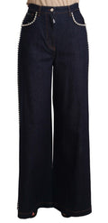 Jeans flare bleu foncé Dolce & Gabbana ornés de cristaux, style élégant et tendance, vue de face.
