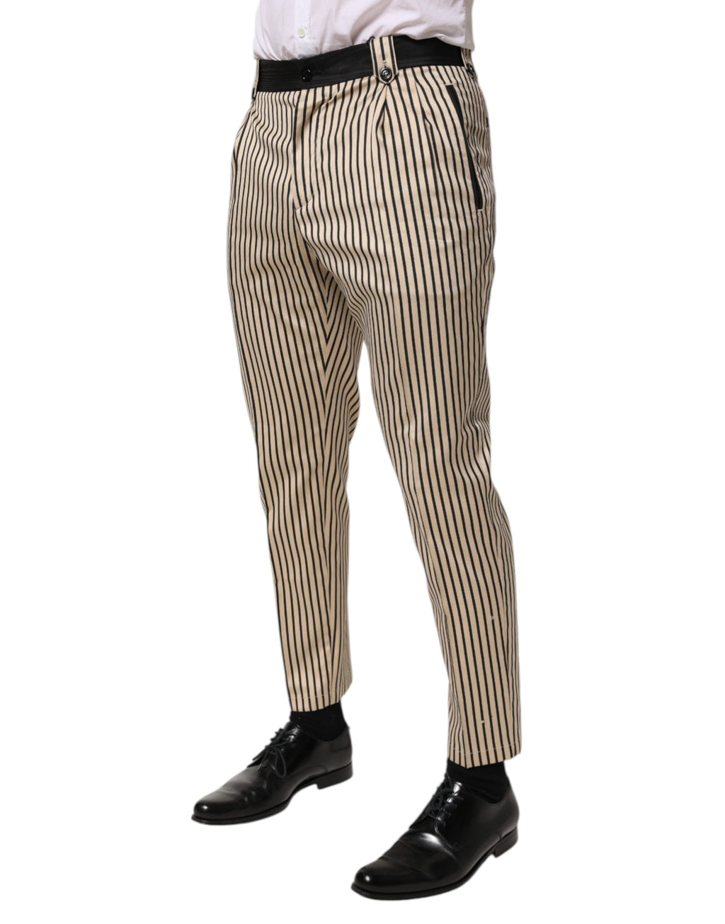 Pantalon slim en coton beige et noir à rayures de Dolce & Gabbana, coupe ajustée et élégante.