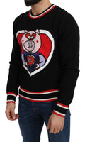 Pull Dolce & Gabbana en cachemire noir avec un motif de cochon de l'année, doux et élégant, vue de face.