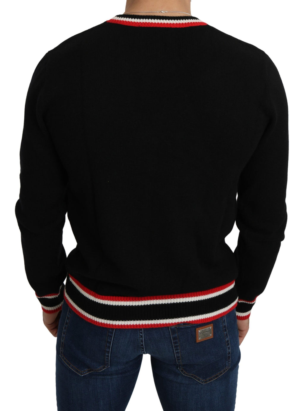 Pull Dolce & Gabbana en cachemire noir avec motif de cochon, style élégant et confortable pour homme.