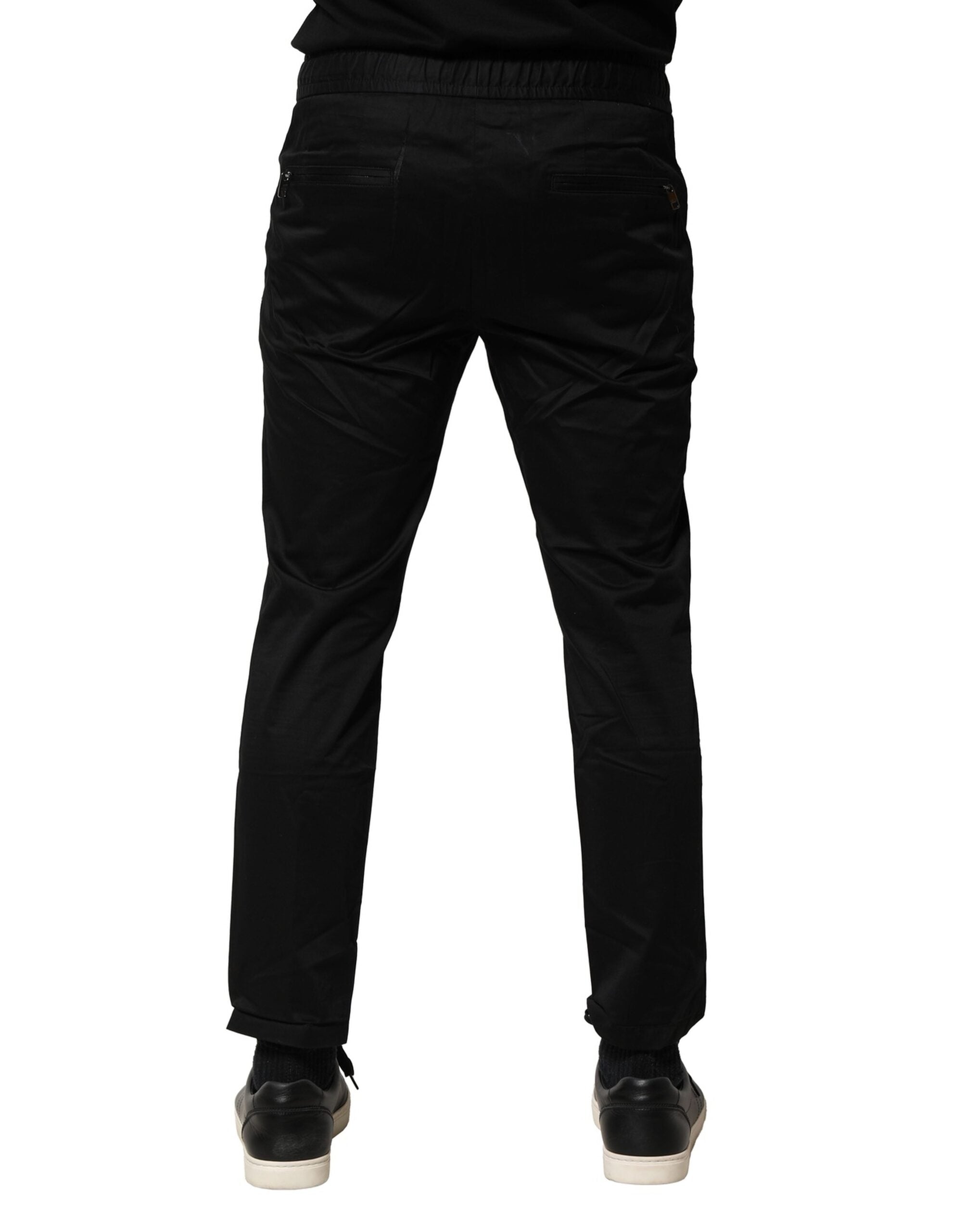 Pantalon jogger noir en coton Dolce & Gabbana à taille moyenne, style décontracté et confortable, visible en détail.