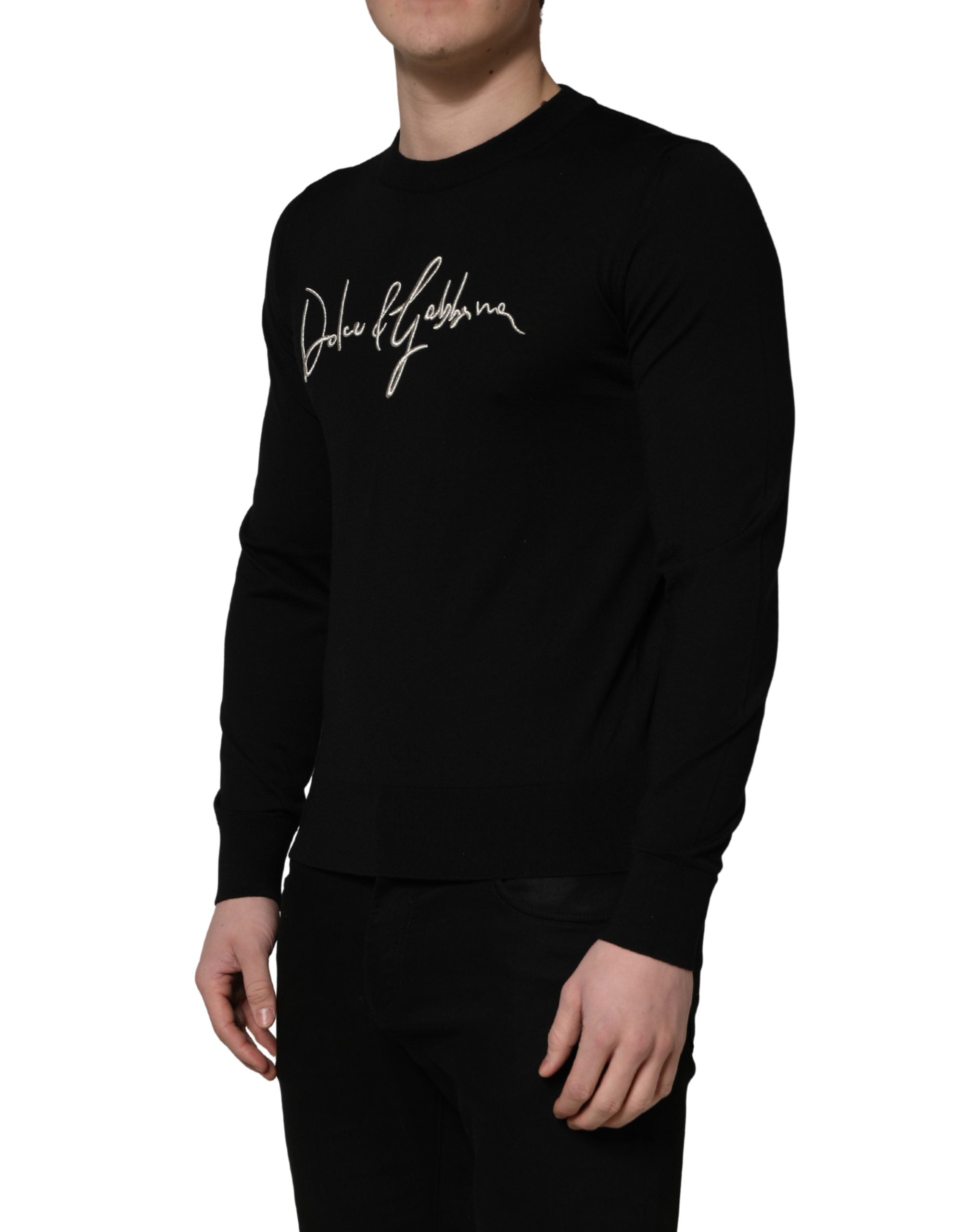 Pull en laine noir Dolce & Gabbana à logo brodé, col rond, pull-over élégant et confortable pour homme.