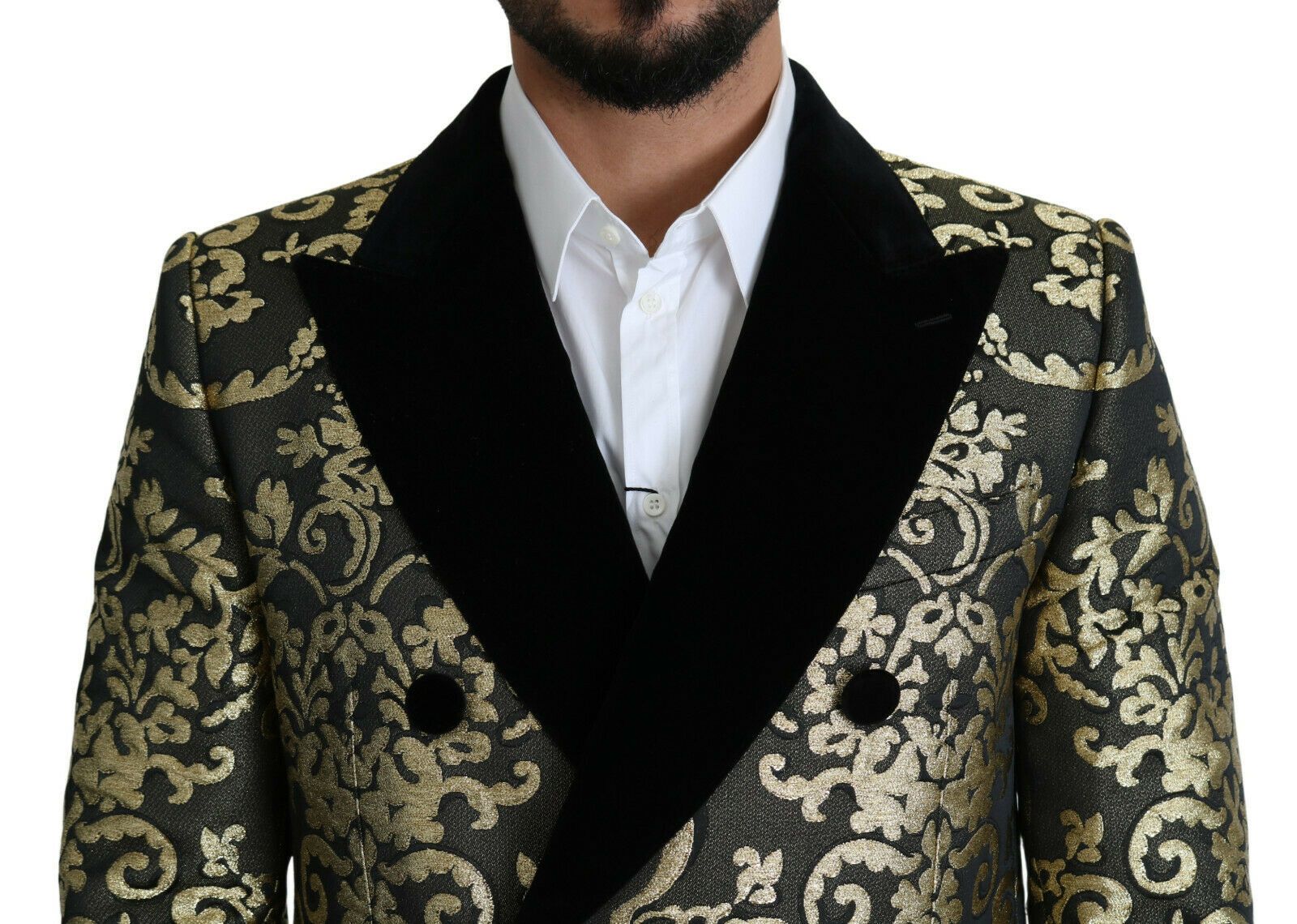 Manteau long en jacquard noir et or de Dolce & Gabbana, modèle Sicilia, avec détails élégants et coupe raffinée.