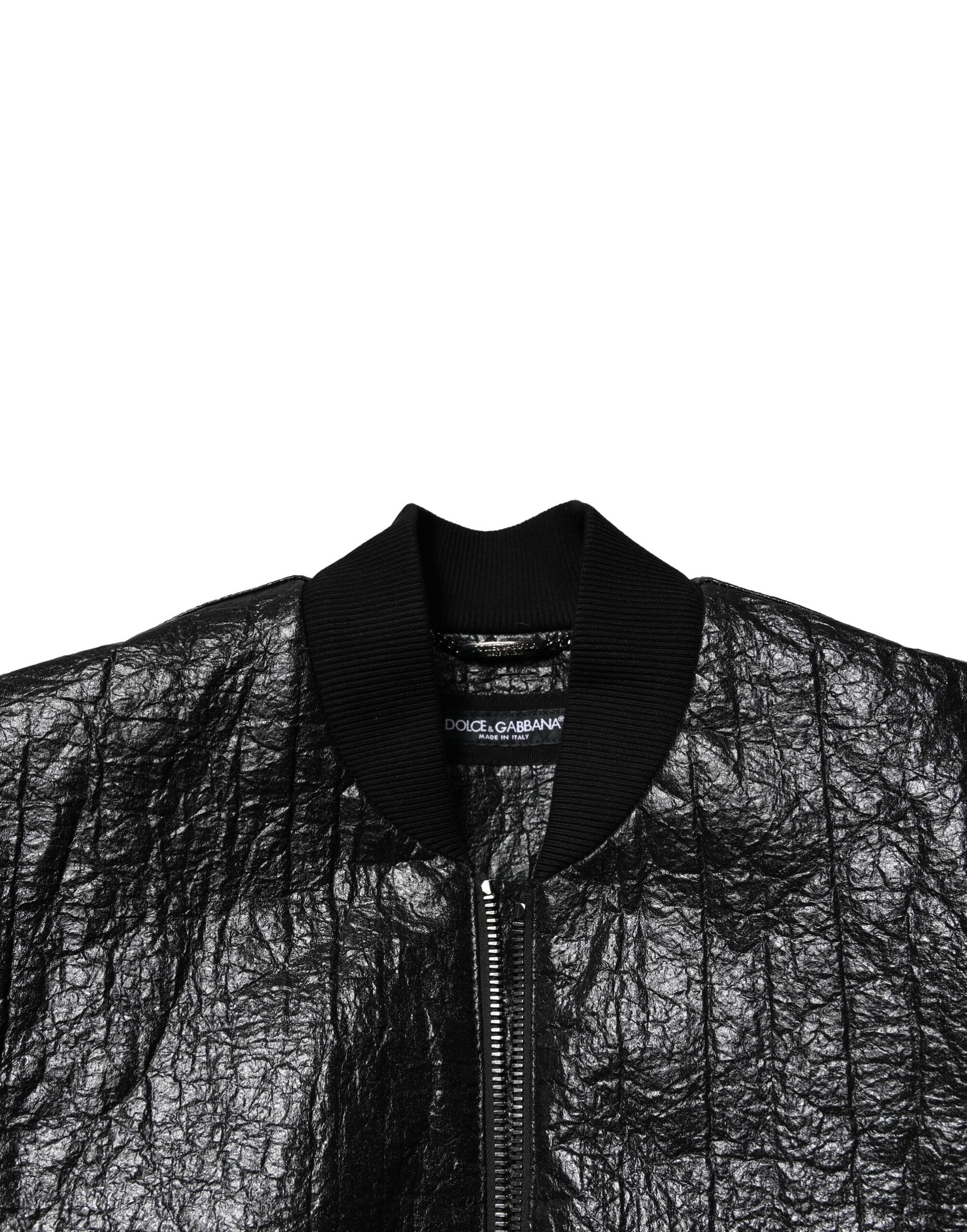 Veste bomber noire Dolce & Gabbana avec plaque logo, fermeture éclair complète, style tendance et élégant.