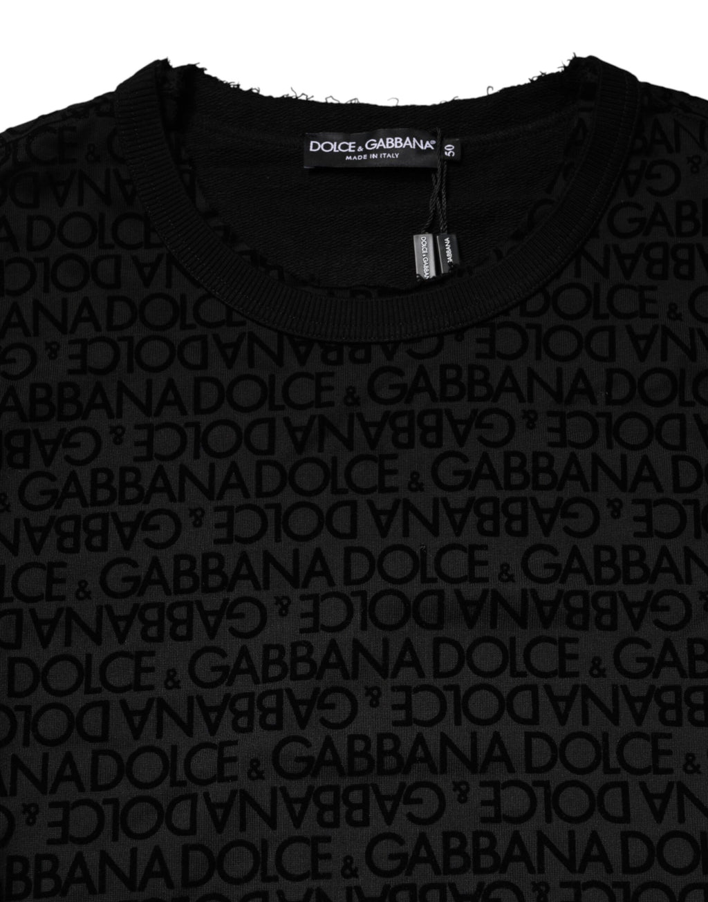 Sweatshirt à col rond noir Dolce & Gabbana avec monogramme, pull en coton élégant et décontracté, visible en gros plan.