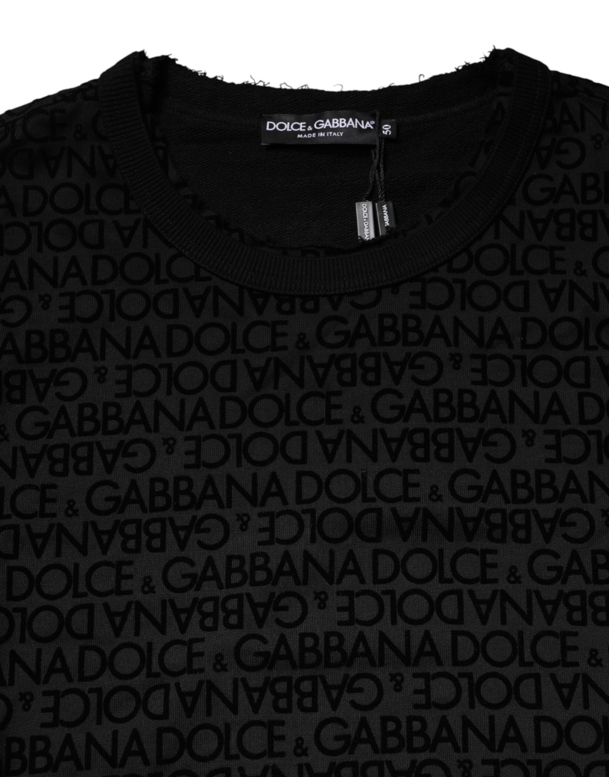 Sweatshirt à col rond noir Dolce & Gabbana avec monogramme, pull en coton élégant et décontracté, visible en gros plan.