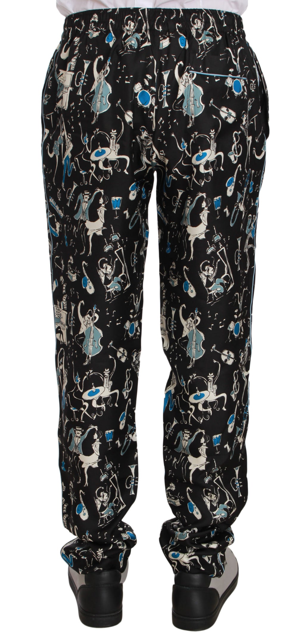 Pantalons de pyjama noirs Dolce & Gabbana avec motif d'instrument de musique, confortables et élégants pour dormir.