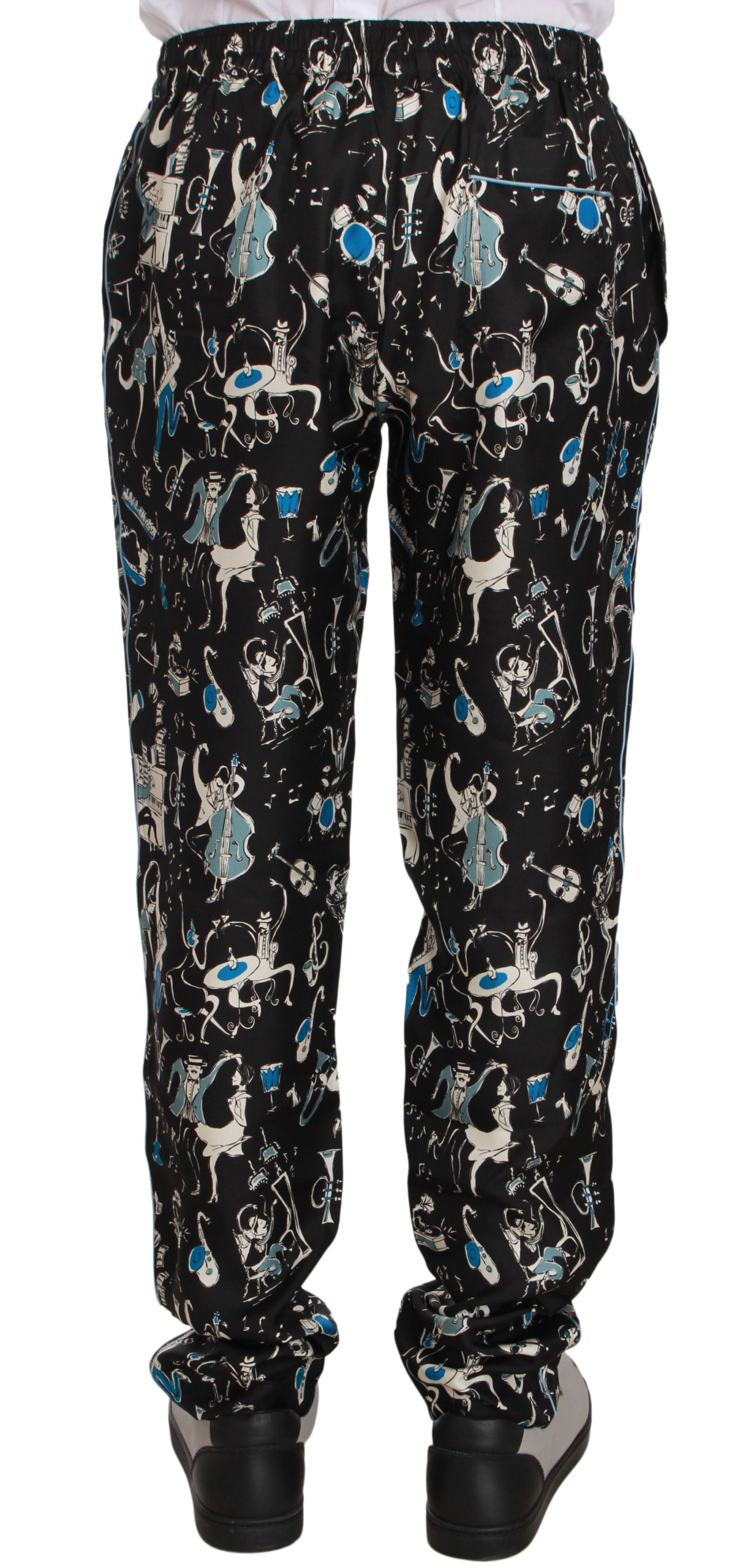 Pantalons de pyjama noirs Dolce & Gabbana avec motif d'instrument de musique, confortables et élégants pour dormir.