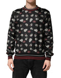 Sweatshirt Dolce & Gabbana à col rond, motif de bague noire, pull en coton avec design graphique élégant.