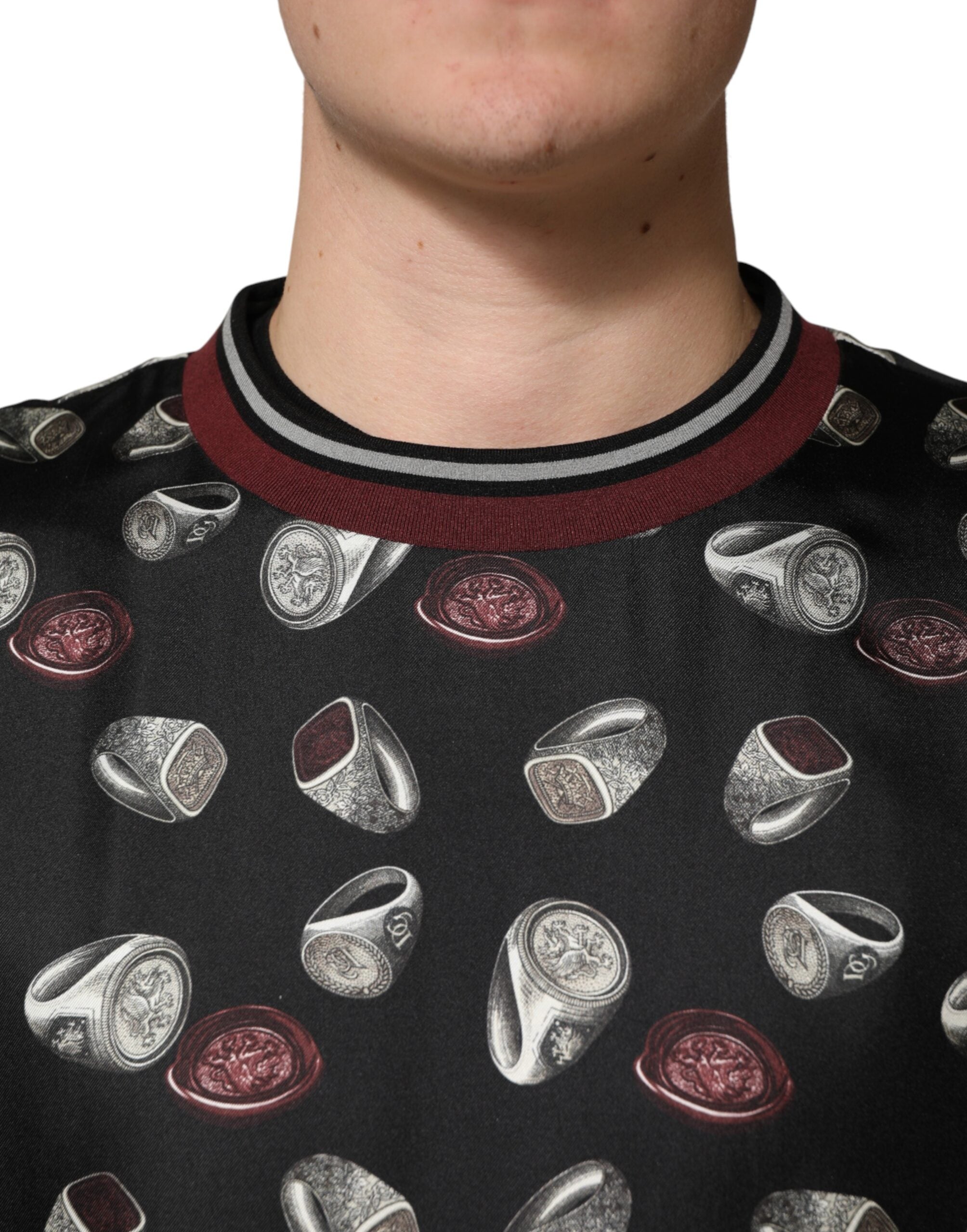 Sweatshirt à col rond Dolce & Gabbana noir avec motif de bagues, pull en coton à manches longues et style décontracté.