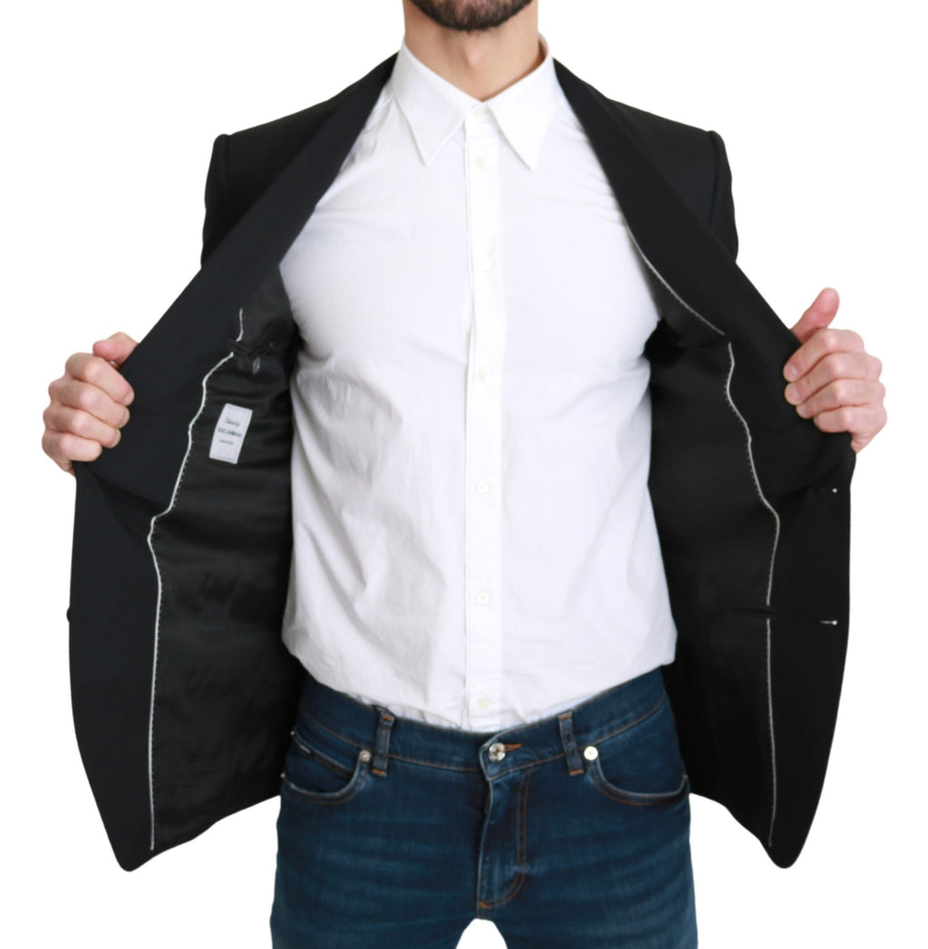 Blazer formel noir en laine à un bouton de Dolce & Gabbana, coupe classique et élégante, porté sur un mannequin.