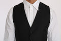 Gilet en laine et soie noire de Dolce & Gabbana, veste cintrée élégante pour homme, détail de tissu visible.
