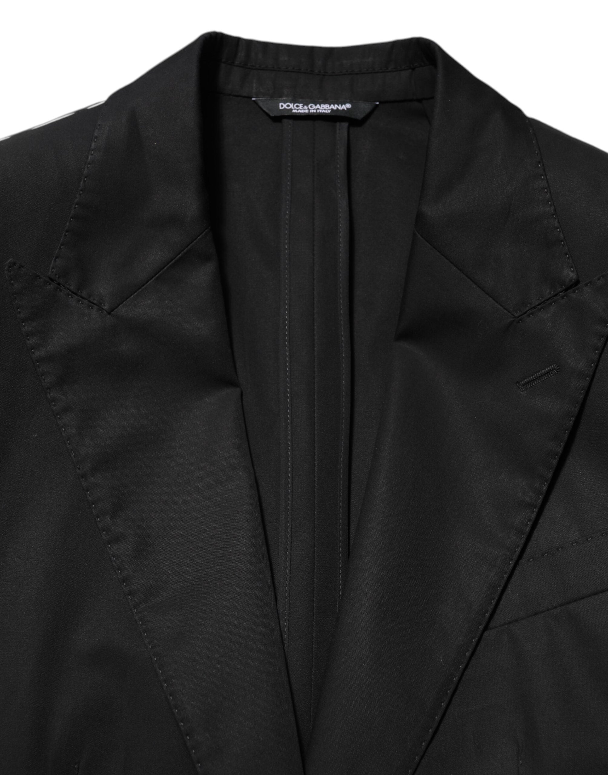 Costume homme Dolce & Gabbana en laine noire avec deux boutons, veste blazer élégante et sophistiquée.