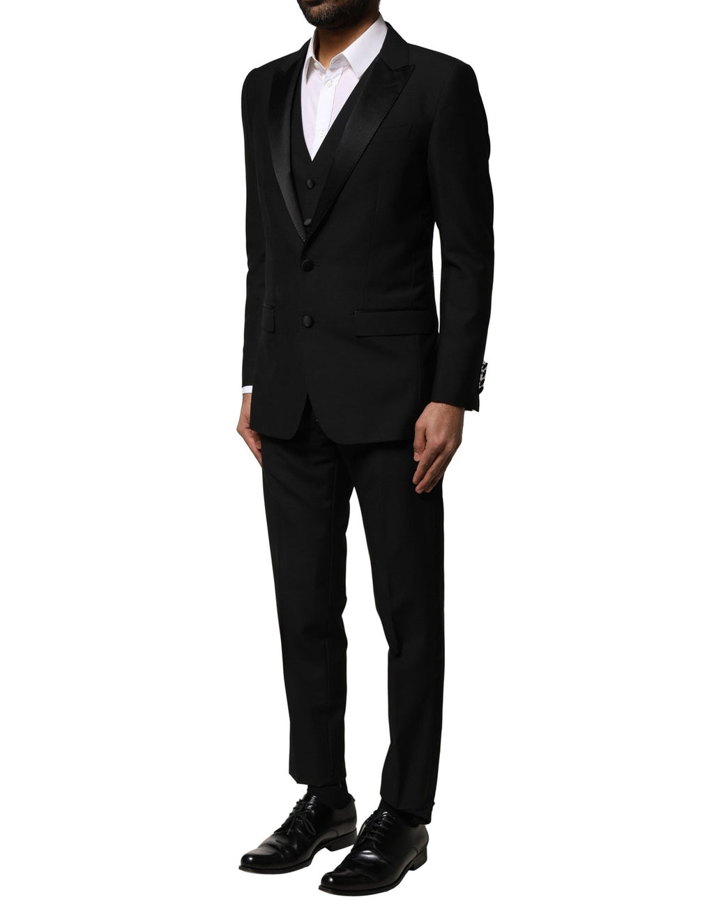 Costume trois pièces en laine noire Dolce & Gabbana, veste à simple boutonnage et pantalon élégant.