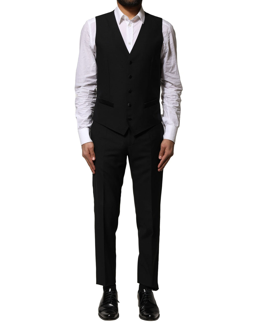 Costume trois pièces en laine noire Dolce & Gabbana, veste à boutonnières simple et pantalon élégant, pour homme.