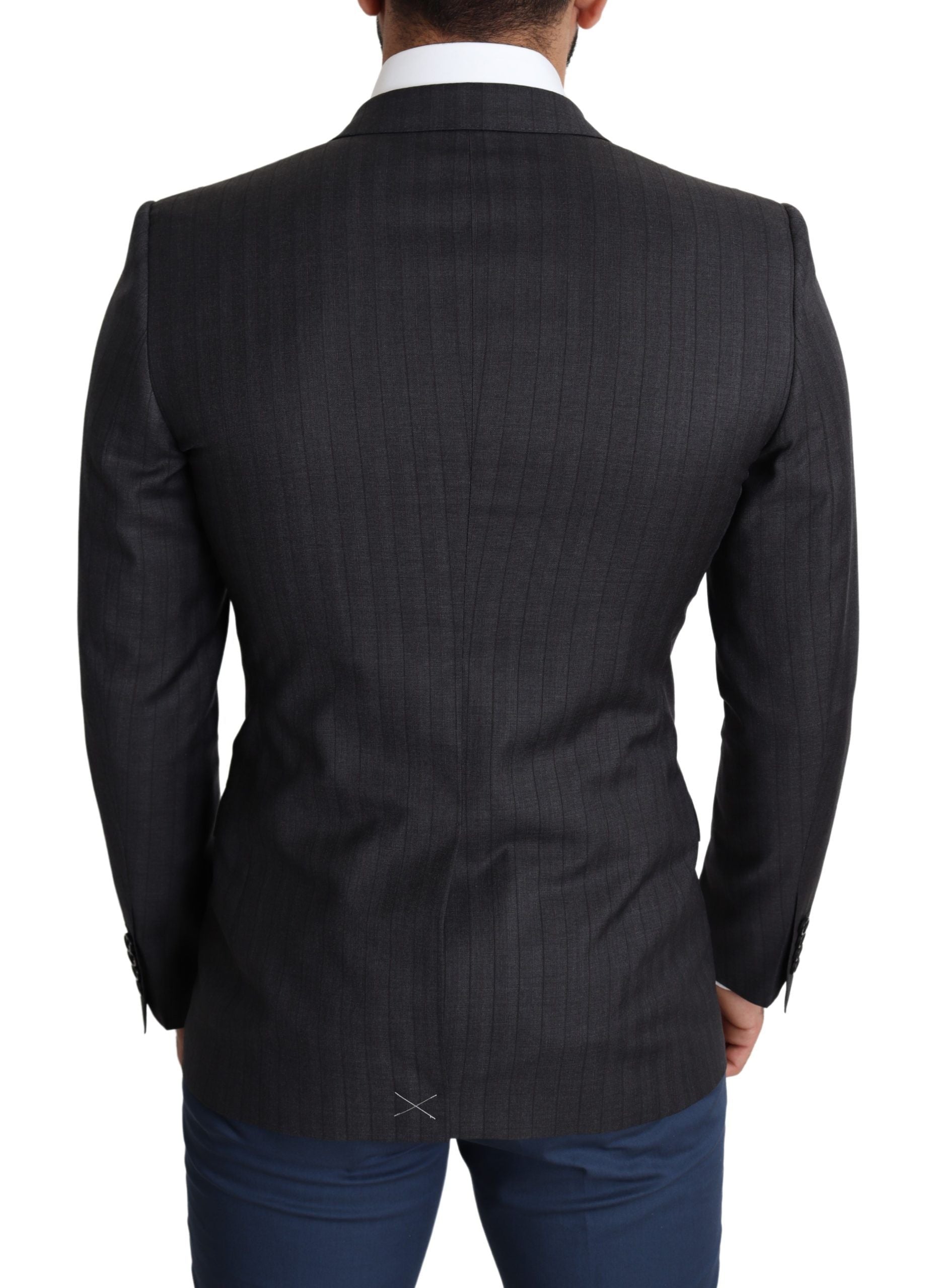 Manteau en laine noir Dolce & Gabbana, blazer à un seul bouton et coupe classique, porté sur un mannequin.