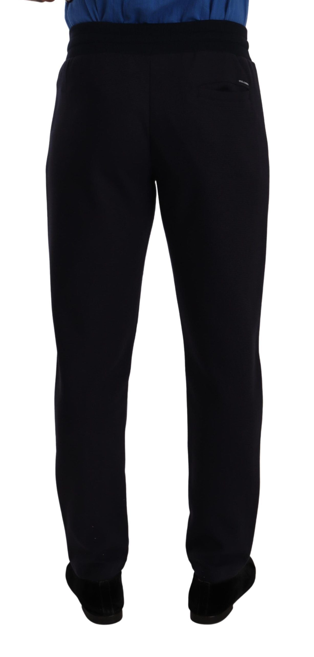 Pantalon de jogging en coton stretch bleu Dolce & Gabbana, style décontracté avec coupe moderne et détails élégants.