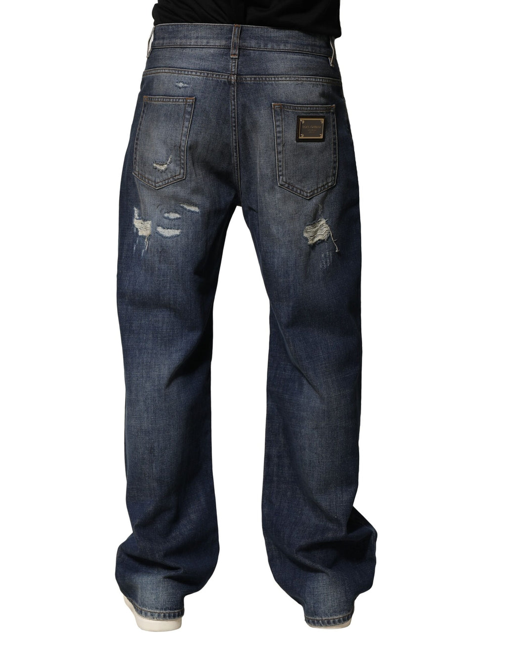 Jeans pour homme Dolce & Gabbana en coton bleu délavé et déchiré, style usé et tendance.