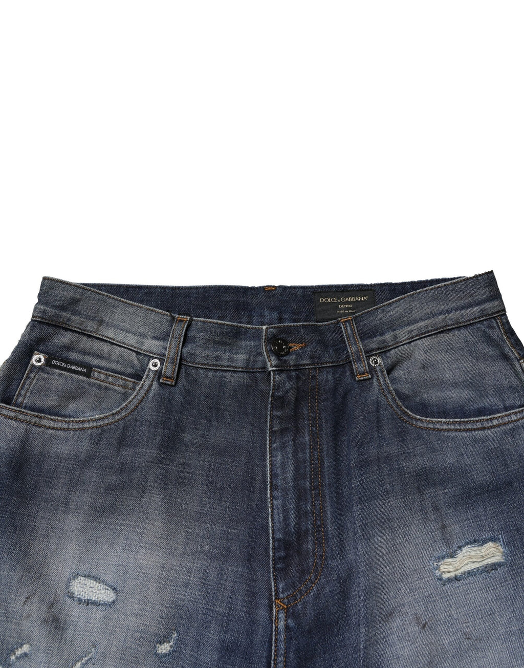 Jeans homme en coton délavé et déchiré Dolce & Gabbana, style usé et tendance, avec détails tachetés.