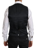 Gilet formel en laine bleue Dolce & Gabbana, élégant et sophistiqué, avec détails classiques pour occasion spéciale.