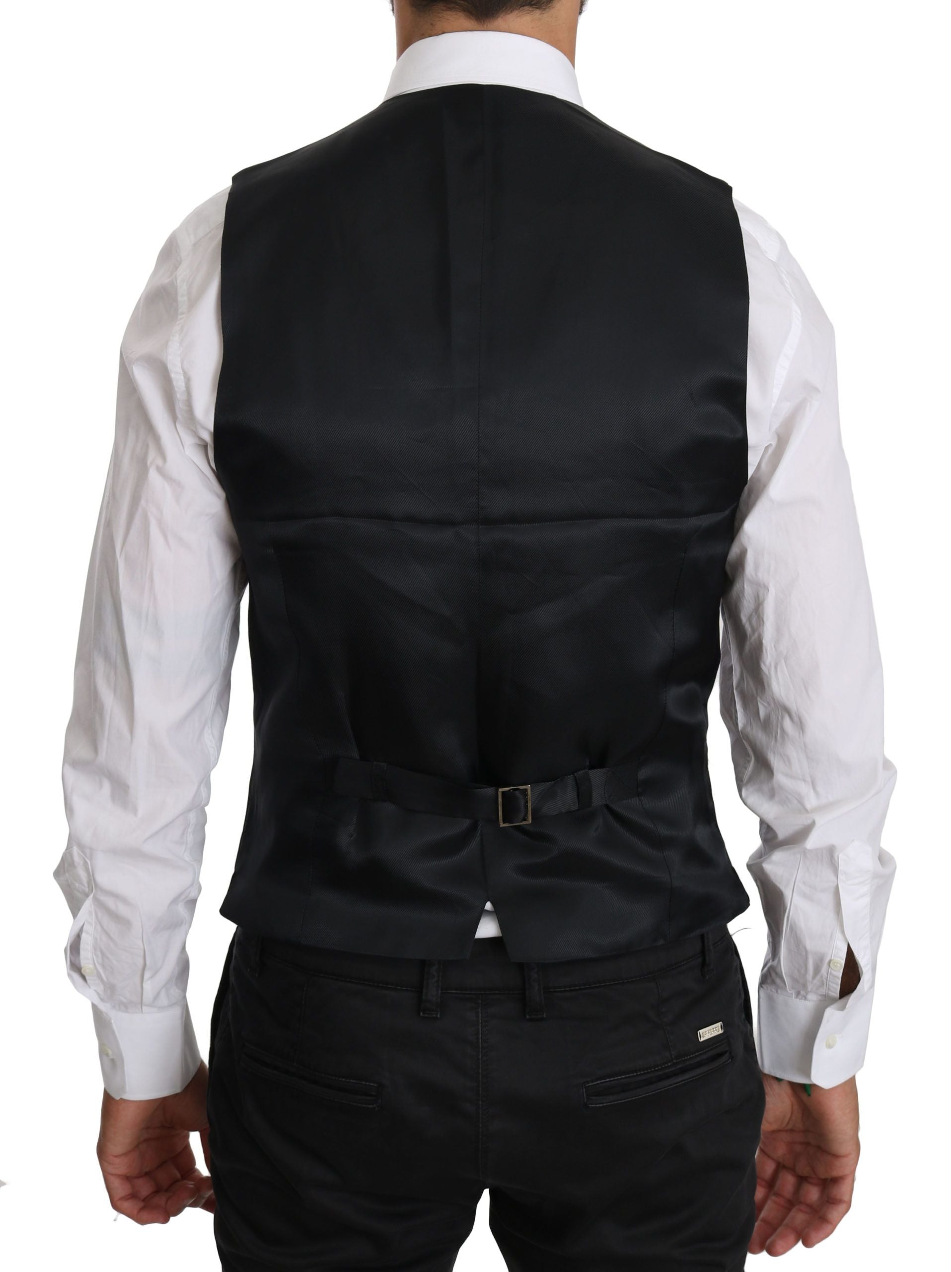 Gilet formel en laine bleue Dolce & Gabbana, élégant et sophistiqué, avec détails classiques pour occasion spéciale.