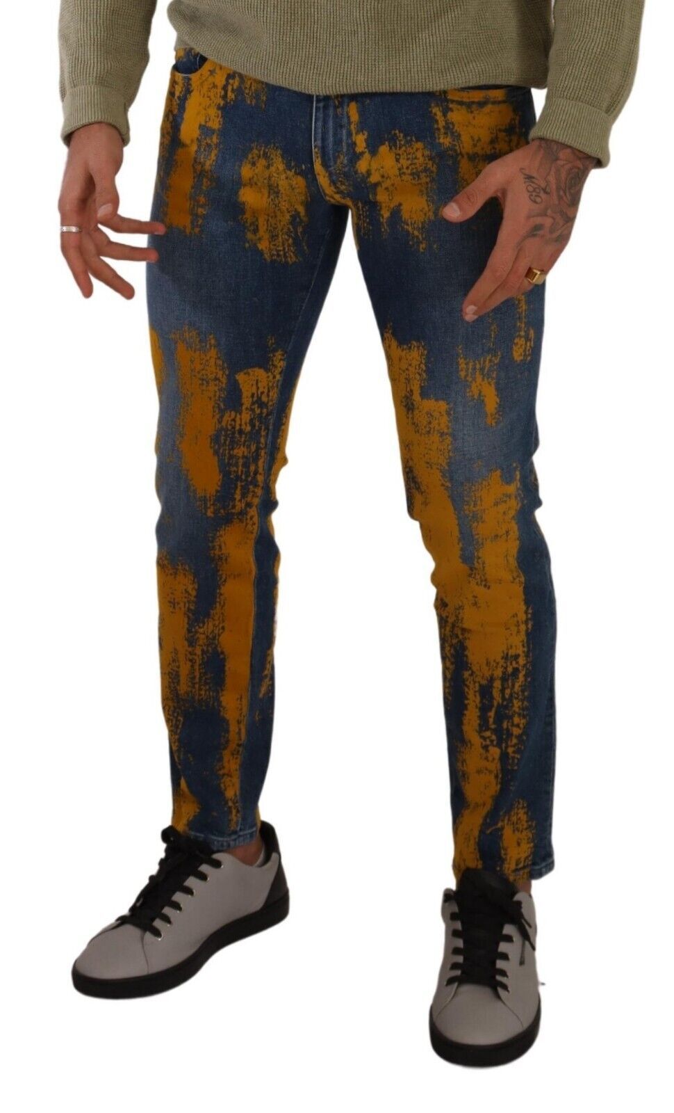 Jeans homme en denim skinny Dolce & Gabbana avec teinture bleue et jaune, coton, style moderne.
