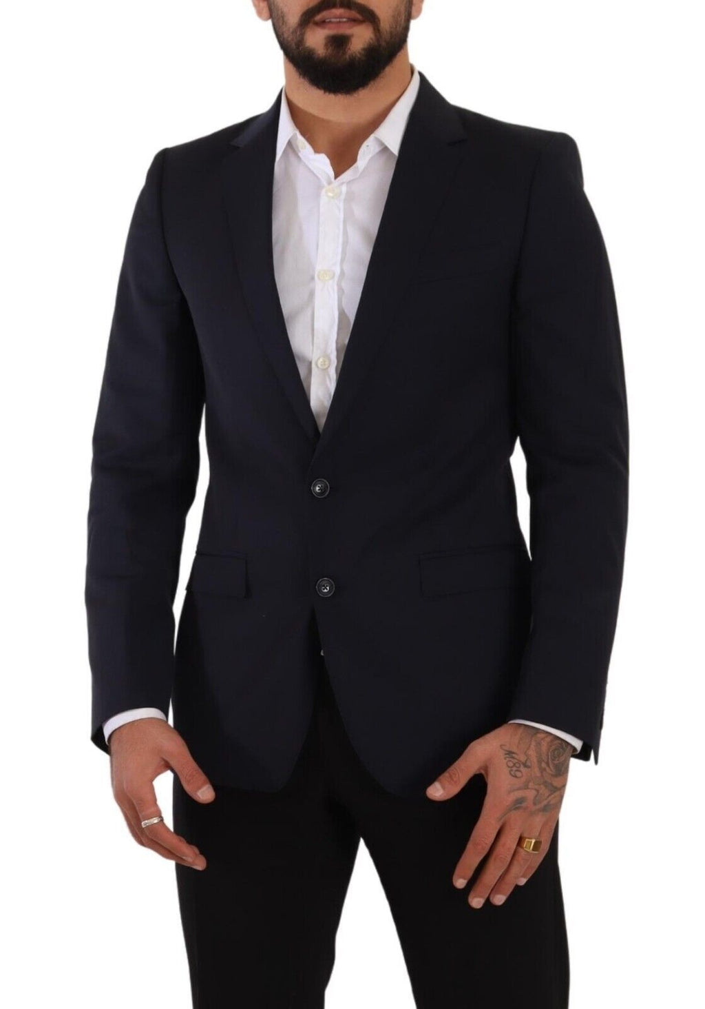 Manteau bleu foncé Dolce & Gabbana Martini blazer à un seul bouton, coupe classique, porté sur mannequin.