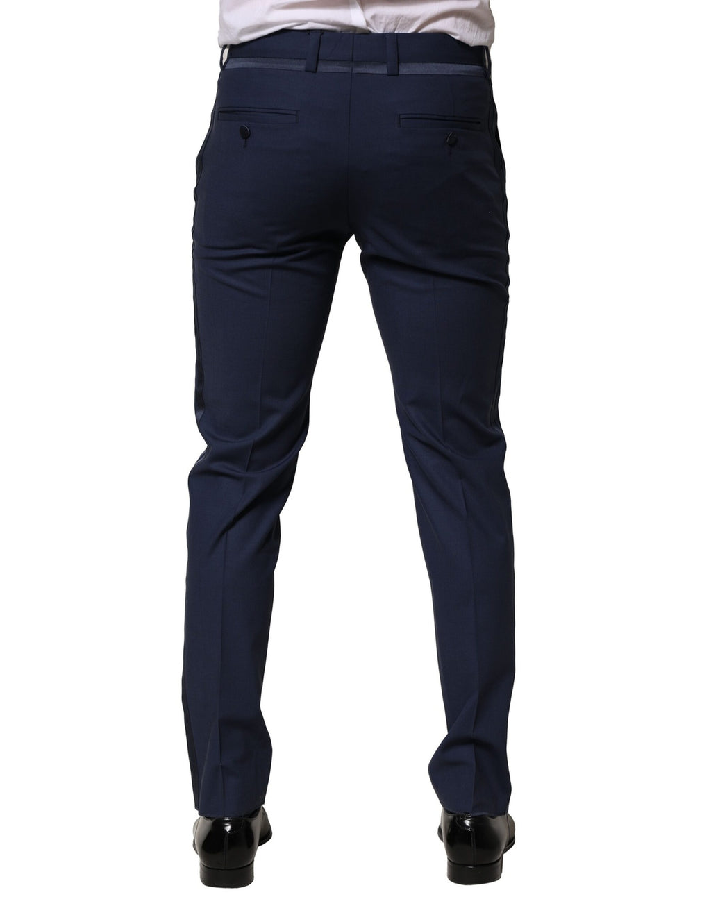 Pantalon formel en laine bleu foncé de Dolce & Gabbana, élégants et sophistiqués pour occasion spéciale.