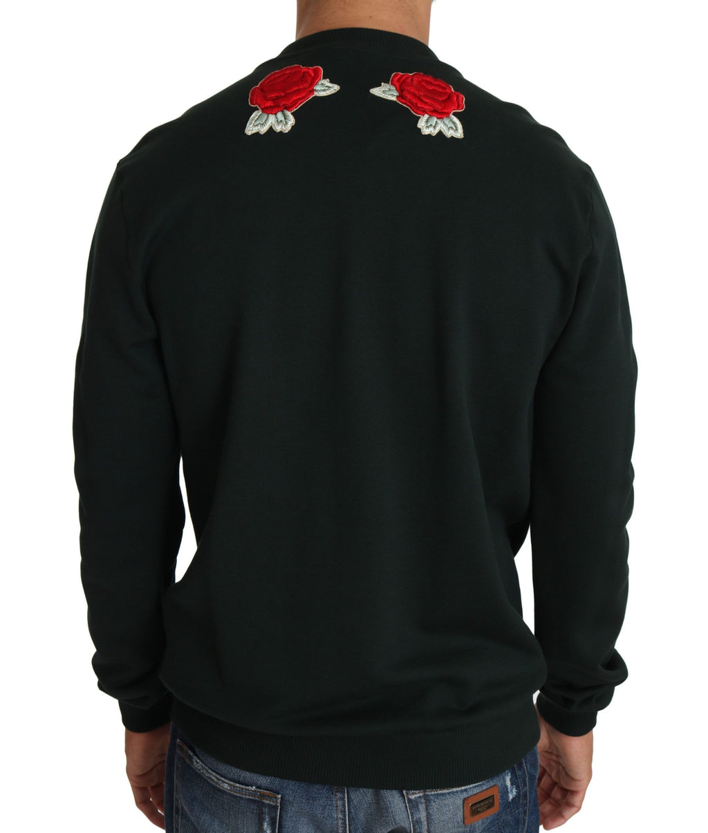Pull Dolce & Gabbana en maille vert avec cœur en cristal et roses, détails élégants et design sophistiqué.