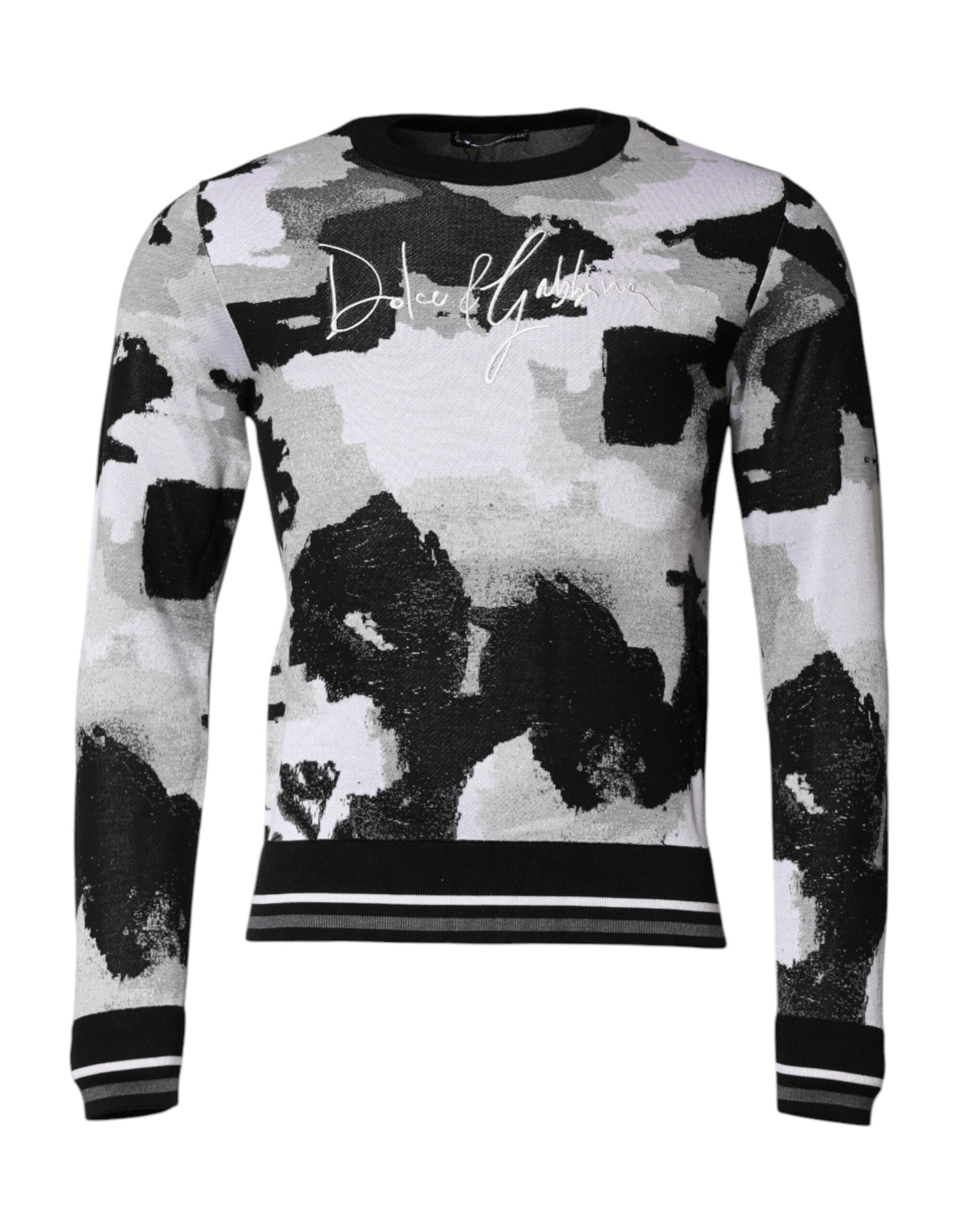 Pull en laine Dolce & Gabbana à logo multicolore, col rond, avec motif coloré et design élégant.