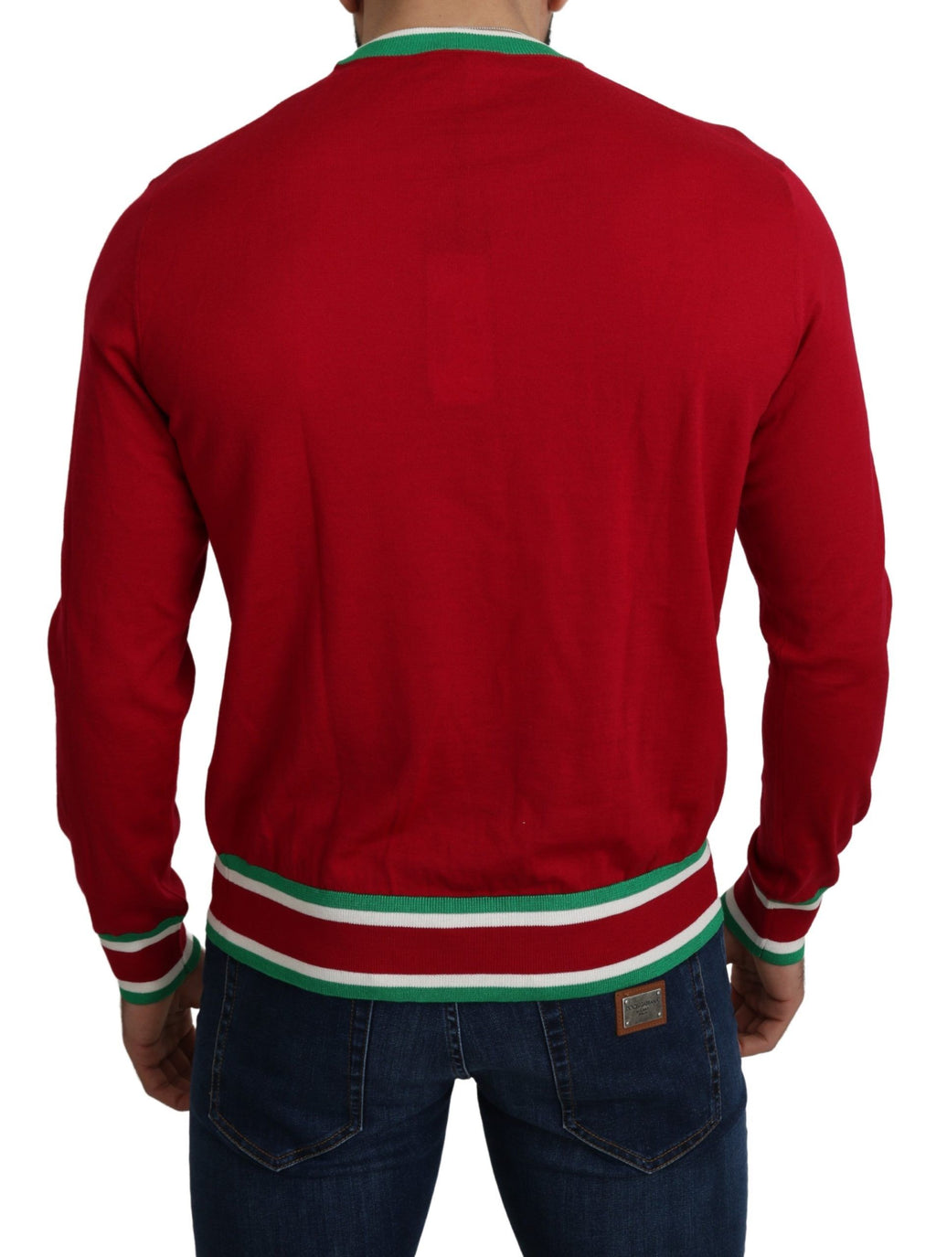Pull Dolce & Gabbana en laine et soie rouge avec motif de porc du Pig of the Year, détail artistique et élégant.