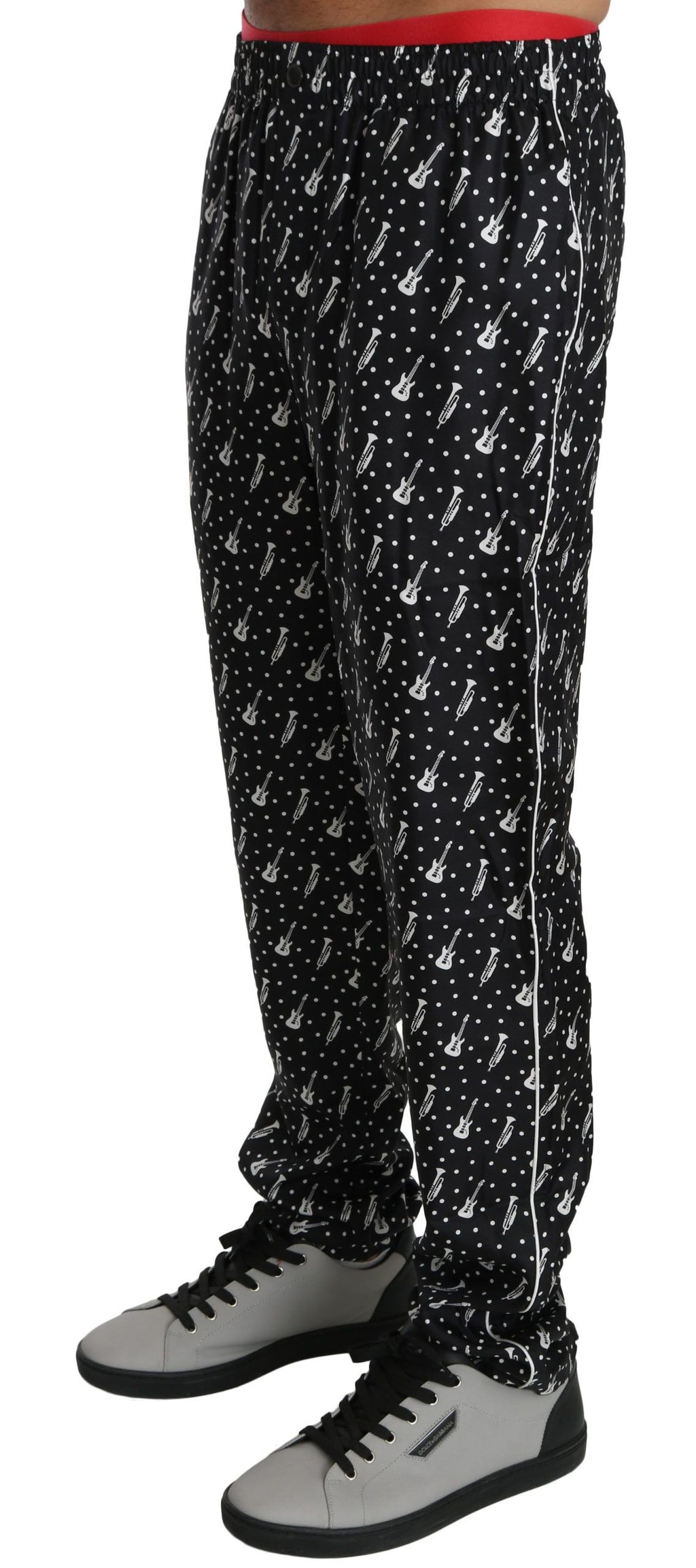 Pantalon noir en soie Dolce & Gabbana avec motif d'instrument de musique, pantalon élégant pour femme.