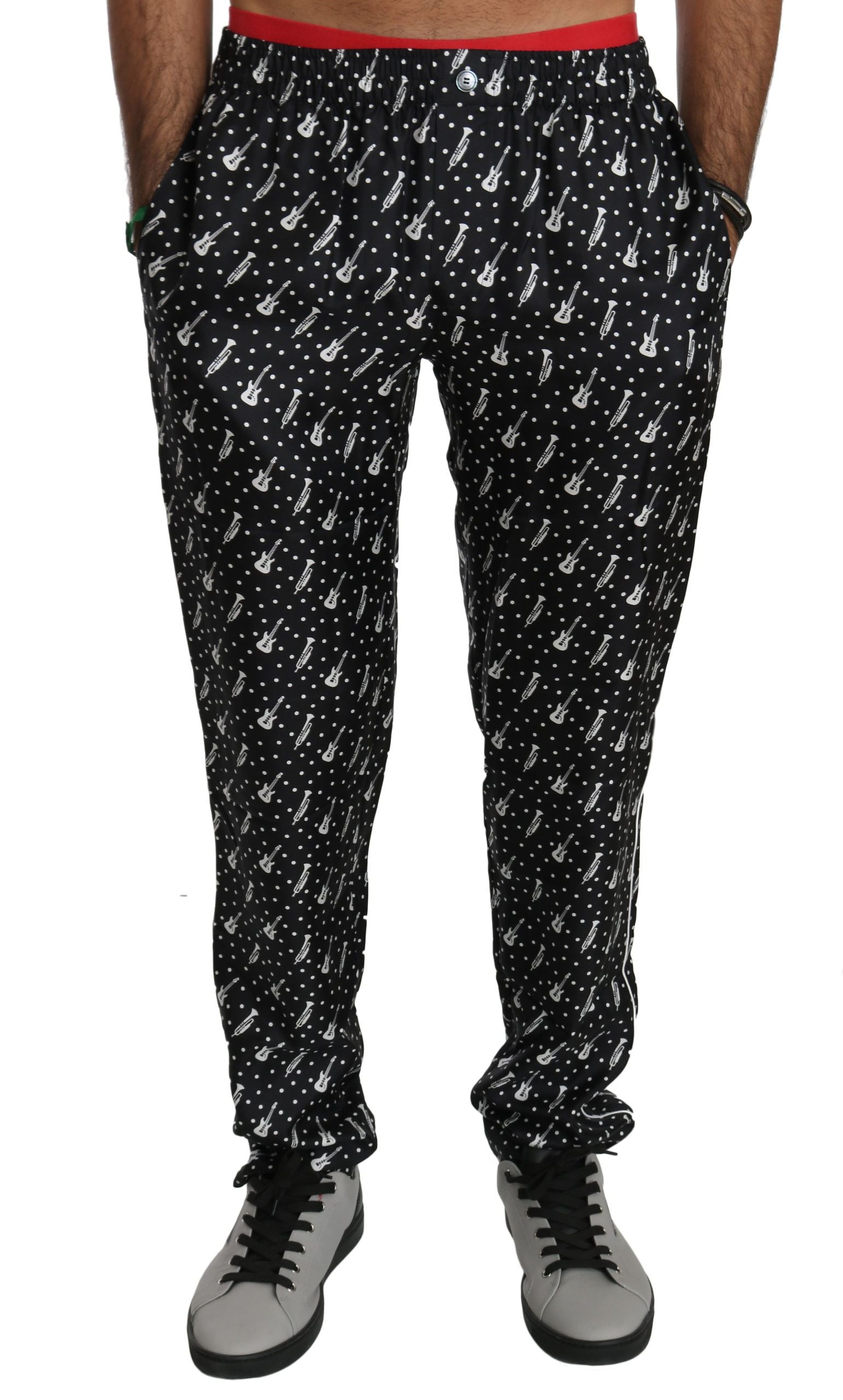 Pantalon en soie noir de Dolce & Gabbana, style musical instrument, coupe élégante, détail sophistiqué.