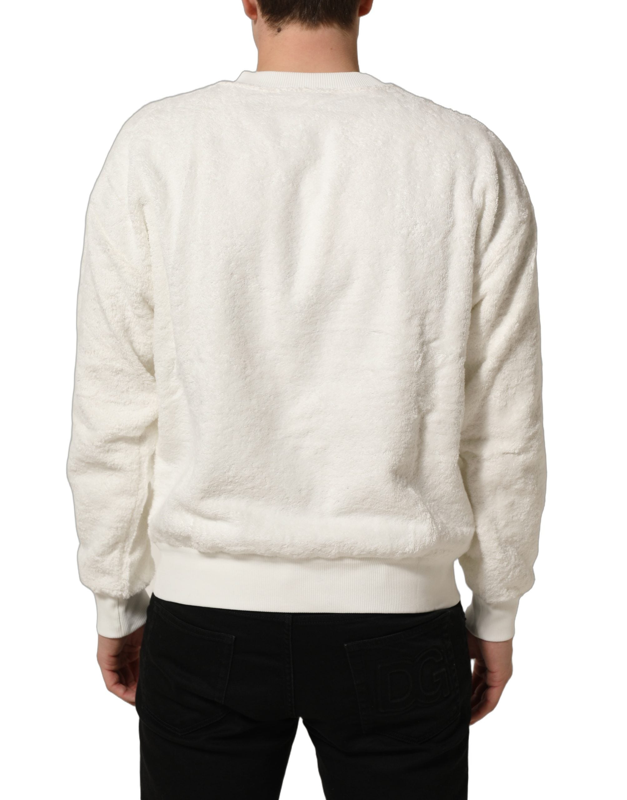 Sweatshirt Dolce & Gabbana blanc avec logo, col rond, en coton, porté sur mannequin.