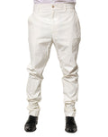 Pantalon homme Dolce & Gabbana en nylon blanc, coupe tapered, style élégant et moderne.