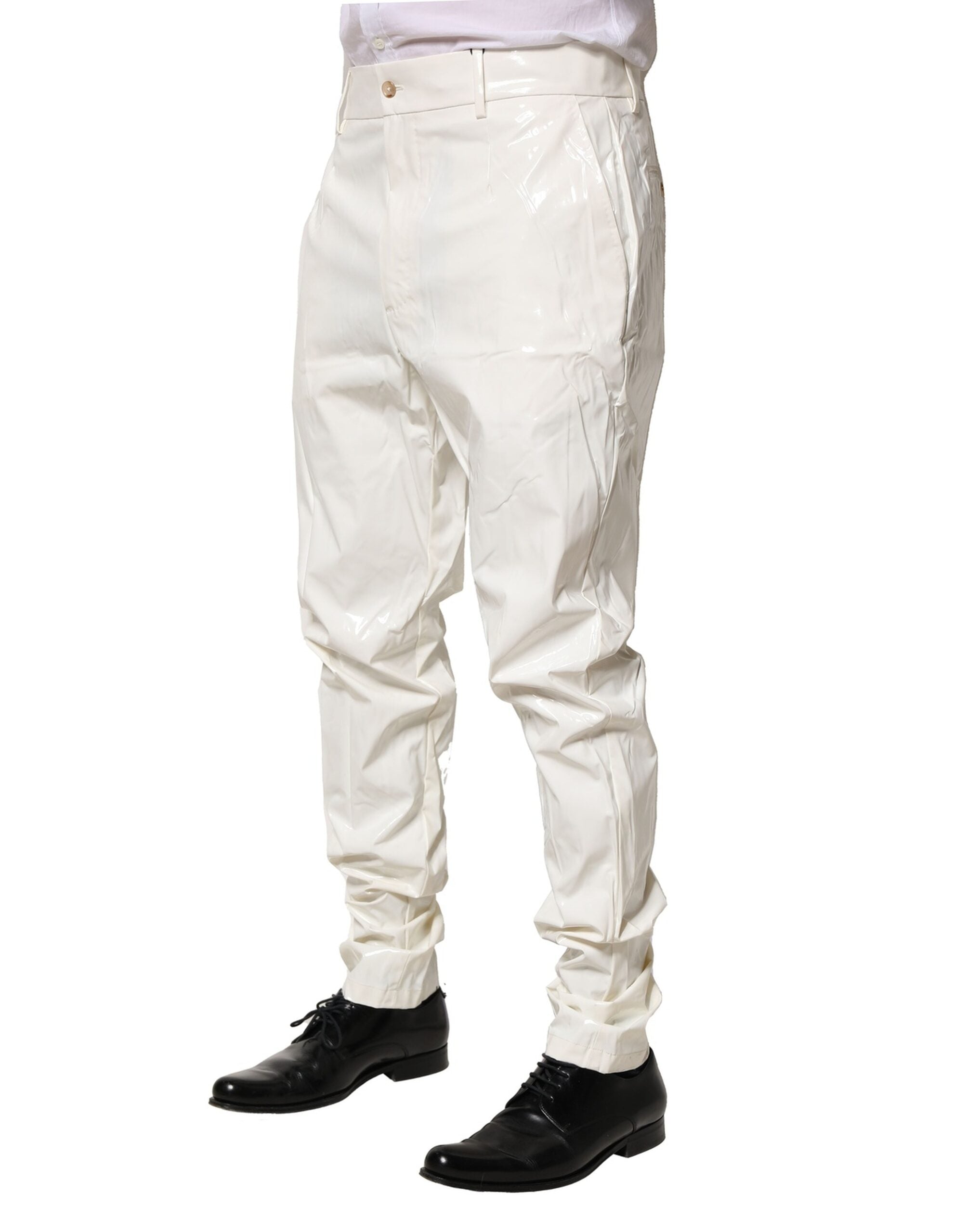 Pantalons homme Dolce & Gabbana en nylon blanc, coupe tapered, style élégant et moderne.