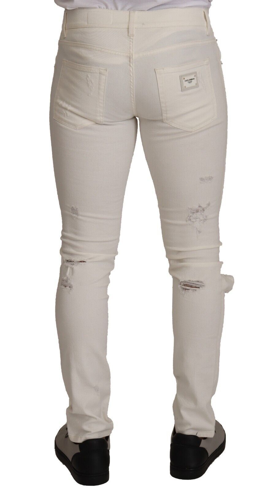 Jeans slim déchirés en coton blanc de Dolce & Gabbana pour homme, coupe skinny, style décontracté et tendance.